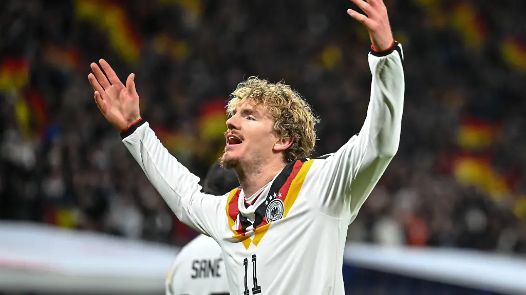 Nick-Woltemade-Germany-celebrates-after-scoring-his-team-s-first-goal-during-the-FIFA-World-Cup-WM-Weltmeisterschaft-Fussball-2026-qualifier-match-between-Germany-and-Slovakia-at-Red-Bull-Arena-on-November-17-2025-in-Leipzig-Germany