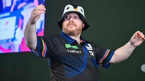 23-12-2025-2025-26-World-Darts-Championship-Justin-Hood-on-his-way-to-the-oche-during-the-2nd-round-of-the-2025-26-Paddy-Power-World-Darts-Championships-at-Alexandra-Palace-London-United-Kingdom-on-23-December-2025