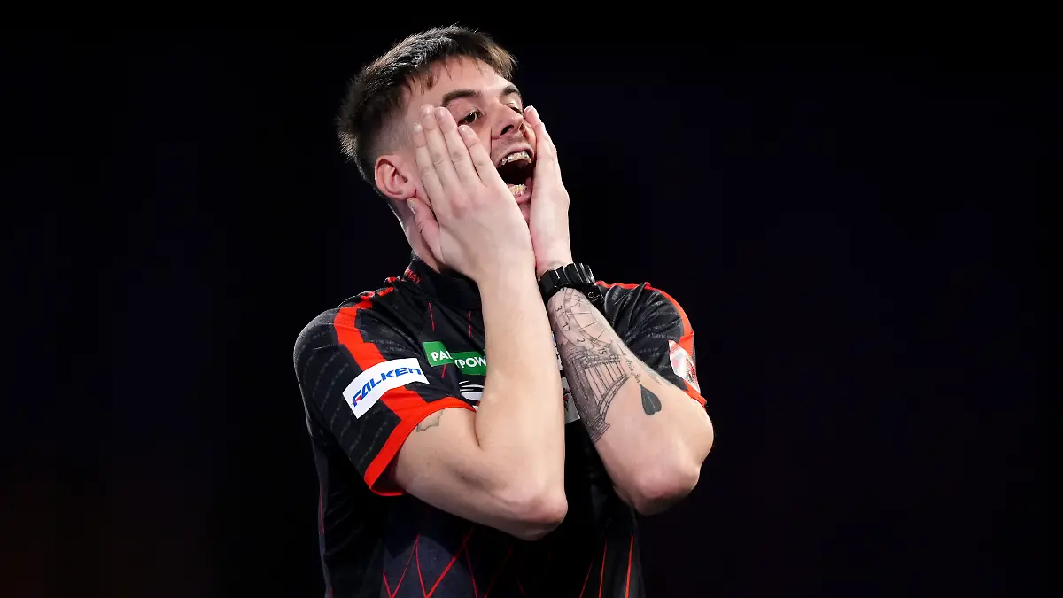 Paddy-Power-World-Darts-Championship-Day-Four-Alexandra-Palace-Dom-Taylor-reacts-during-his-match-against-Oskar-Lukasiak-on-day-four-of-the-Paddy-Power-World-Darts-Championship-at-the-Alexandra-Palace-London-Picture-date-Sunday-December-14-2025-See-PA-story-DARTS-World-Photo-credit-should-read-John-Walton-PA-Wire-RESTRICTIONS-Use-subject-to-restrictions-Editorial-use-only-no-commercial-use-without-prior-consent-from-rights-holder