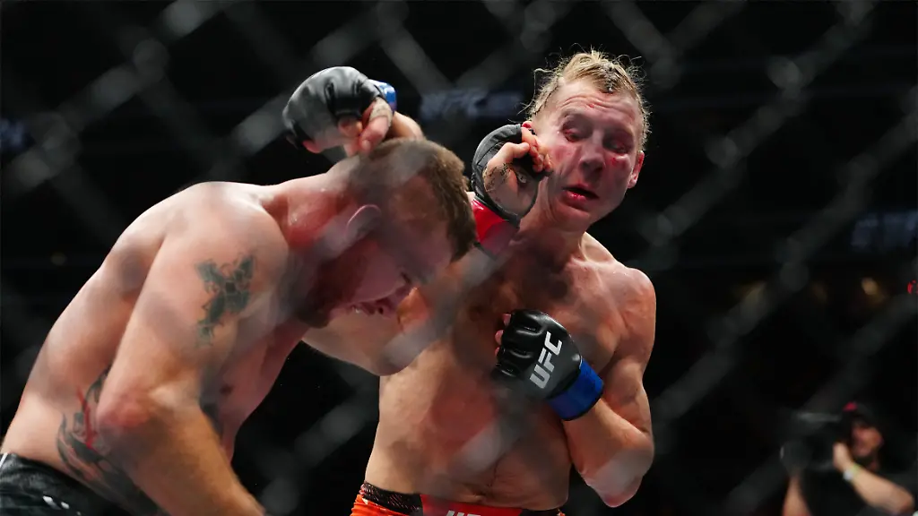 Jan-24-2026-Las-Vegas-Nevada-USA-Justin-Gaethje-red-gloves-fights-Paddy-Pimblett-blue-gloves-during-UFC-324-at-T-Mobile-Arena-Mandatory-Credit-Stephen-R