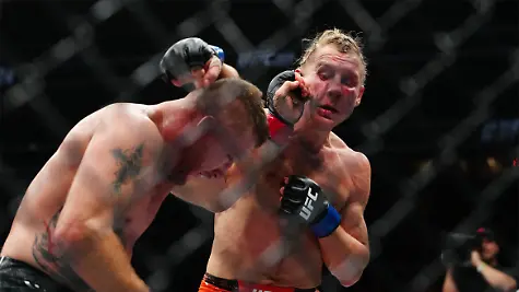 Jan-24-2026-Las-Vegas-Nevada-USA-Justin-Gaethje-red-gloves-fights-Paddy-Pimblett-blue-gloves-during-UFC-324-at-T-Mobile-Arena-Mandatory-Credit-Stephen-R