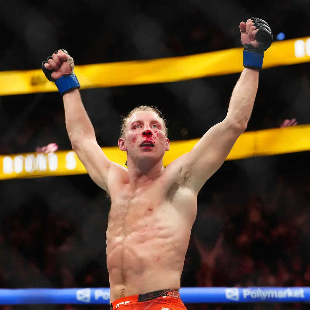 Jan-24-2026-Las-Vegas-Nevada-USA-Paddy-Pimblett-blue-gloves-reacts-in-the-fight-against-Justin-Gaethje-red-gloves-during-UFC-324-at-T-Mobile-Arena-Mandatory-Credit-Stephen-R
