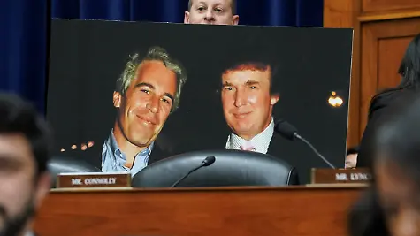 Rep-Jared-Moskowitz-D-FL-holds-up-a-photo-of-former-U-S-President-Donald-Trump-with-late-sex-offender-Jeffrey-Epstein-during-a-meeting-of-the-the-House-Oversight-and-Accountability-Committee-to-markup-a-resolution-and-report-to-hold-Hunter-Biden-President-Joe-Biden-s-son-in-contempt-of-Congress-after-he-refused-to-appear-for-a-closed-door-deposition-at-the-Capitol-in-Washington-U-S-January-10-2024