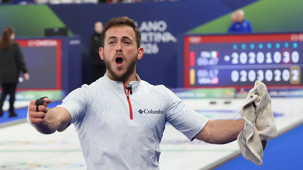 Team-USA-s-Korey-Dropkin-celebrates-victory-over-Italy-in-the-Curling-Mixed-Doubles-Semi-Finals-at-the-2026-Winter-Olympics-in-Cortina-Italy-on-Monday-February-09-2026-Team-USA-beat-Italy-9-8