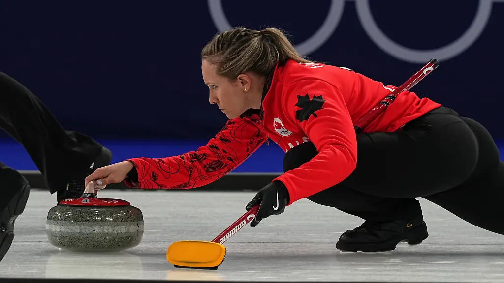 Canada-s-Rachel-Homan-in-action-during-the-women-s-curling-round-robin-session-against-Switzerland-at-the-2026-Winter-Olympics-in-Cortina-d-Ampezzo-Italy-Saturday-Feb-14-2026