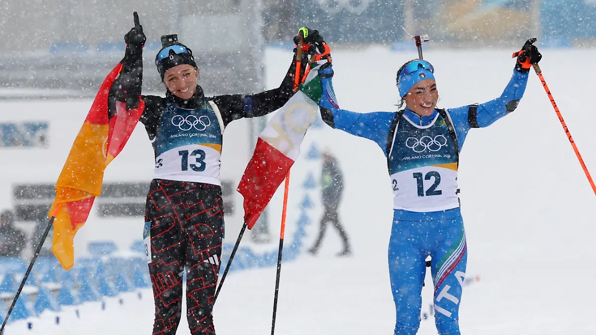 Milano-Cortina-2026-Olympics-Biathlon-Women-s-12-5km-Mass-Start-Anterselva-Biathlon-Arena-South-Tyrol-Italy-February-21-2026-Franziska-Preuss-of-Germany-and-Dorothea-Wierer-of-Italy-react-after-the-Women-s-12