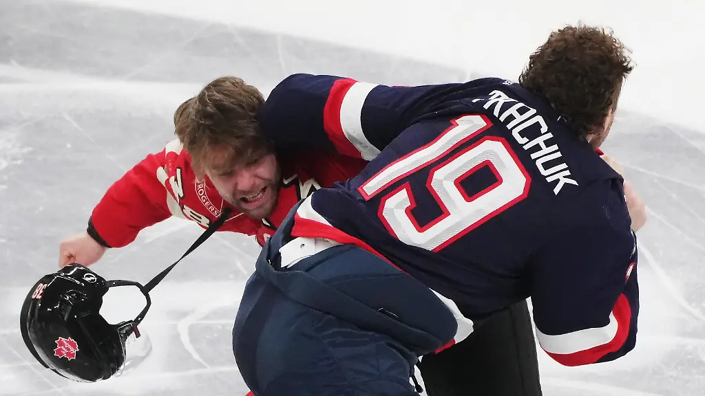 February-15-2025-Montreal-Pq-Canada-p-Canada-s-Brandon-Hagel-left-and-United-States-Matthew-Tkachuk-19-fight-during-first-period-4-Nations-Face-Off-hockey-action-in-Montreal-on-Saturday-Feb-15-2025