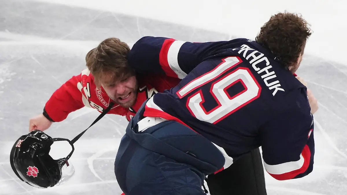 February-15-2025-Montreal-Pq-Canada-p-Canada-s-Brandon-Hagel-left-and-United-States-Matthew-Tkachuk-19-fight-during-first-period-4-Nations-Face-Off-hockey-action-in-Montreal-on-Saturday-Feb-15-2025