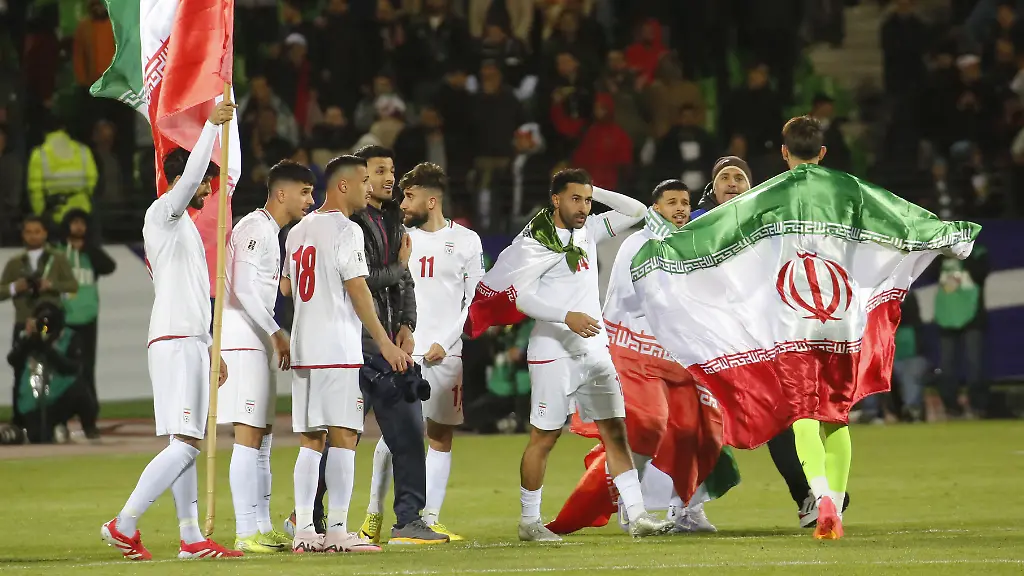 TEHRAN-IRAN-MARCH-25-Players-of-Iran-celebrate-after-the-2026-FIFA-World-Cup-Asian-Qualifiers-Group-A-game-between-Iran-and-Uzbekistan-at-Azadi-Stadium-on-March-25-2025-in-Tehran-Iran-Iran-s-national-football-team-celebrated-after-securing-qualification-for-the-2026-FIFA-World-Cup-with-a-2-2-draw-against-Uzbekistan-Fatemeh-Bahrami-Anadolu-ABACAPRESS