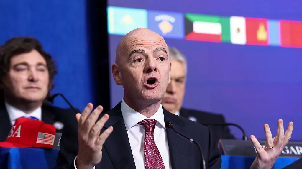 FIFA-president-Gianni-Infantino-speaks-as-he-and-Argentina-s-President-Javier-Milei-attend-the-inaugural-Board-of-Peace-meeting-at-the-U-S-Institute-of-Peace-in-Washington-D-C-U-S-February-19-2026