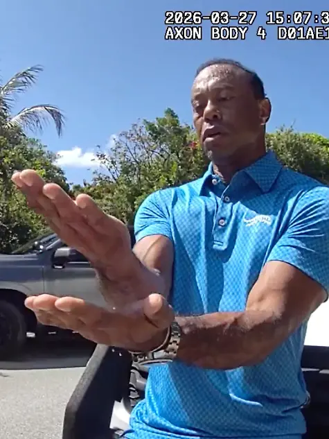 In-this-image-from-police-body-camera-video-released-by-the-Martin-County-Fla-Sheriff-s-Office-golfer-Tiger-Woods-performs-a-field-sobriety-test-for-sheriff-s-deputies-following-a-car-crash-in-Jupiter-Island-Fla-Friday-March-27-2026