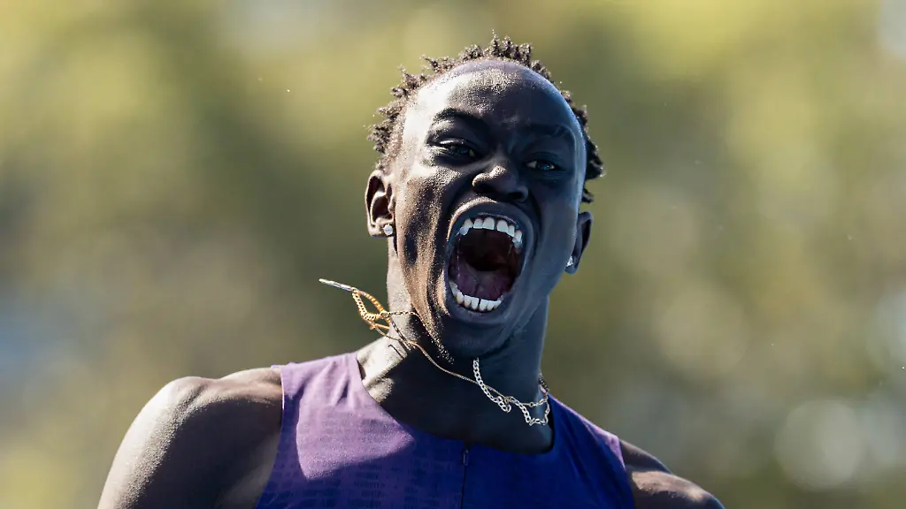 April-12-2026-Sydney-Nsw-Australia-GOUT-GOUT-of-Queensland-celebrates-after-winning-the-menAaa-s-200m-final-in-19-67-seconds-at-the-2026-Australian-Athletics-Championships