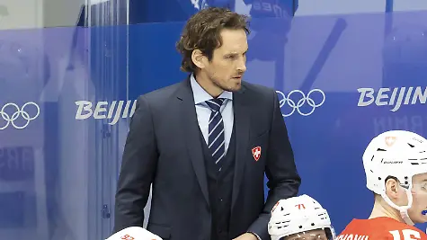 Patrick-Fischer-head-coach-of-Switzerland-national-ice-hockey-team-looks-the-game-during-the-men-s-ice-hockey-qualification-play-off-game-between-the-Czech-Republic-and-Switzerland-at-the-National-Indoor-Stadium-at-the-2022-Winter-Olympics-in-Beijing-China-on-Tuesday-February-15-2022