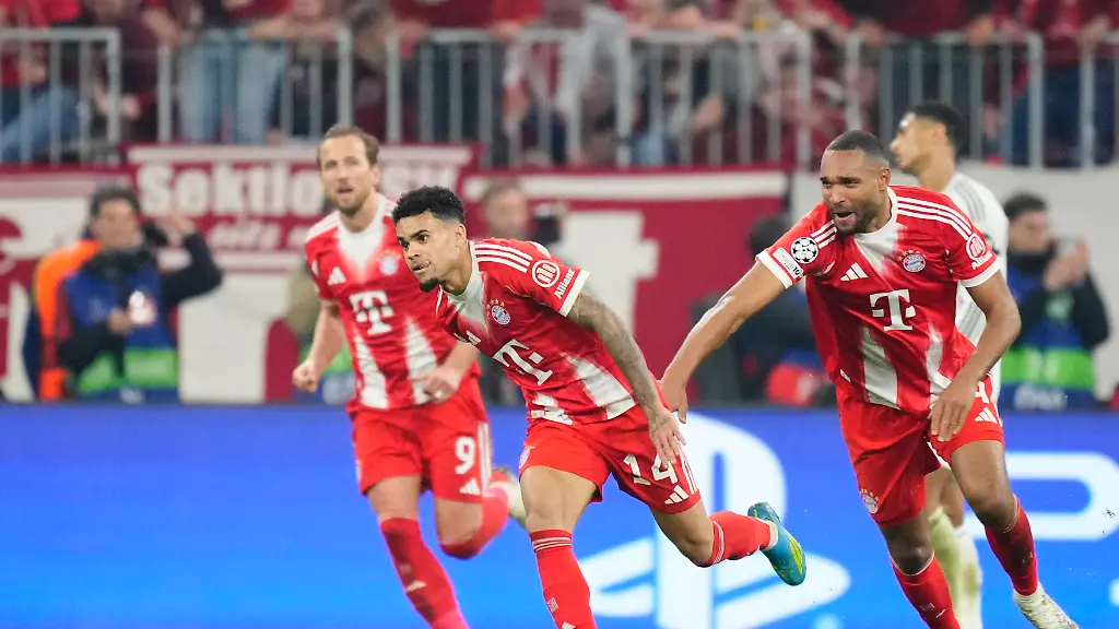Luis-Diaz-left-winger-of-Bayern-Munchen-and-Colombia-celebrates-after-scoring-his-sides-first-goal-during-the-UEFA-Champions-League-2025-26-Quarter-Final-Second-Leg-match-between-FC-Bayern-MA-nchen-and-Real-Madrid-CF-at-Football-Arena-Munich-on-April-15-2026-in-Munich-Germany
