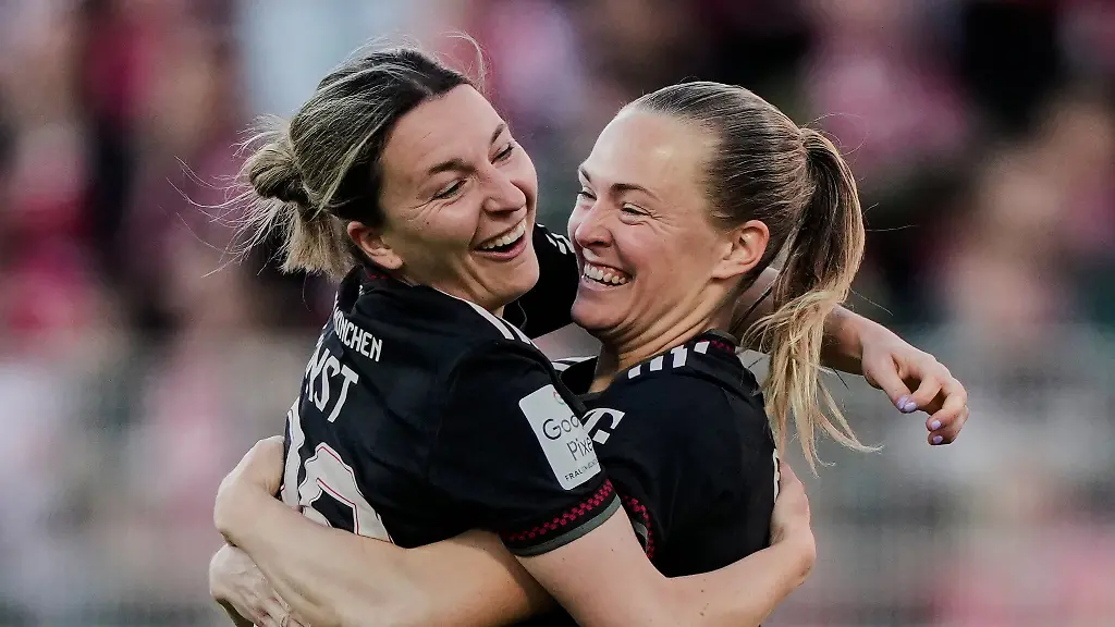 Bayern-s-Magdalena-Eriksson-right-and-Bayern-s-Barbara-Dunst-celebrate-their-side-s-second-goal-during-a-German-women-s-Bundesliga-soccer-match-between-1-FC-Union-Berlin-and-Bayern-Munich-in-Berlin-Germany-Wednesday-April-22-2026