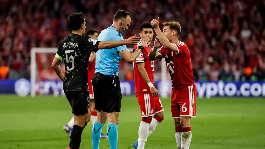 MUNICH-GERMANY-MAY-6-Joshua-Kimmich-FC-FC-Bayern-Munich-6-discusses-with-referee-Joao-Pinheiro-and-Marquinhos-FC-Paris-Saint-Germain-5-during-the-UEFA-Champions-League-Semi-Final-between-FC-FC-Bayern-Munich-vs-Paris-Saint-Germain-at-Allianz-Arena-at-Semi-Finals-2nd-leg-of-the-UEFA-Champions-League-on-May-6-2026-in-Munich-Germany