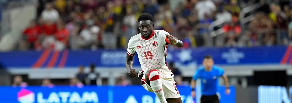 FILE-PHOTO-Jul-5-2024-Arlington-TX-USA-Venezuela-defender-Jon-Mikel-Aramburu-4-knocks-the-ball-away-from-Canada-defender-Alphonso-Davies-19-during-the-first-half-in-the-2024-Copa-America-quarterfinal-at-AT-T-Stadium
