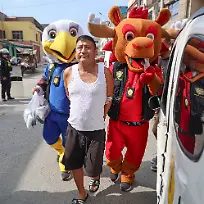 This-handout-picture-released-by-Peru-s-National-Police-shows-officers-from-the-Terna-Unit-fancy-dressed-as-mascots-of-the-FIFA-World-Cup-arresting-a-man-during-an-undercover-operation-under-a-search-and-seizure-warrant-for-the-alleged-crime-of-small-scale-drug-trafficking-in-Lima-on-June-10-2026