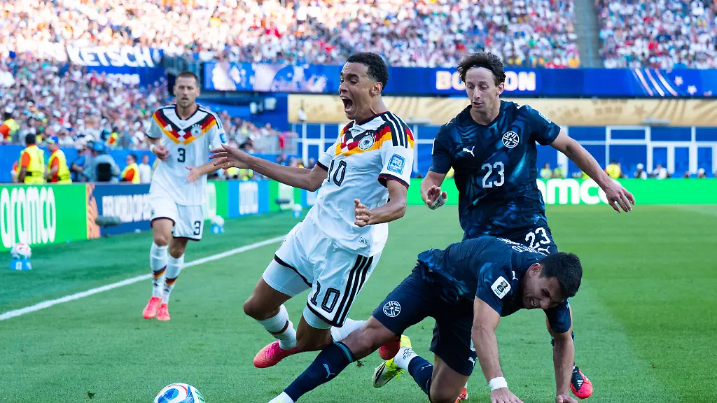 Junior-Alonso-Paraguay-6-foult-Jamal-Musiala-Germany-10-FIFA-World-Cup-WM-Weltmeisterschaft-Fussball-2026-Deutschland-v-Paraguay-29-June-2026-FIFA-World-Cup-2026-Germany-v-Paraguay-Round-of-32-at-Boston-Stadium-in-Foxborough-Massachusetts-USA-Junior-Alonso-Paraguay-6-fouls-Jamal-Musiala-Germany-10-2026-FIFA-World-Cup-Germany-vs-Paraguay-June-29-2026-2026-FIFA-World-Cup-Germany-vs