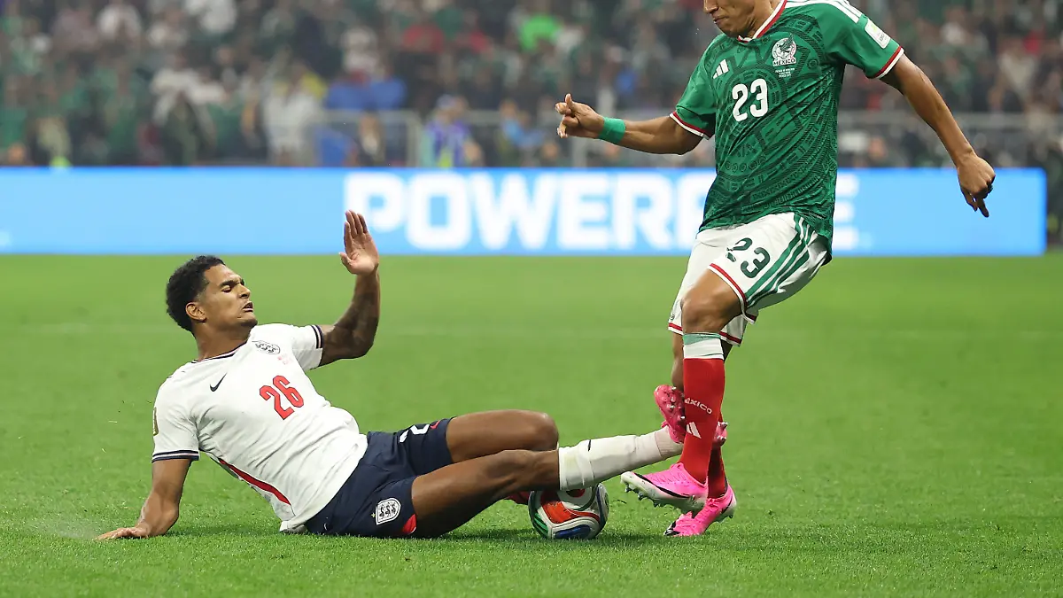 MEXICO-CITY-MEXICO-JULY-05-Jesus-Gallardo-23-of-Mexico-is-tackled-by-Jarell-Quansah-26-of-England-during-the-FIFA-World-Cup-2026-Round-of-16-match-between-Mexico-and-England-at-Mexico-City-Stadium-on-July-05-2026-in-Mexico-City-Mexico-Quansah-was-issued-a-red-card-on-the-play