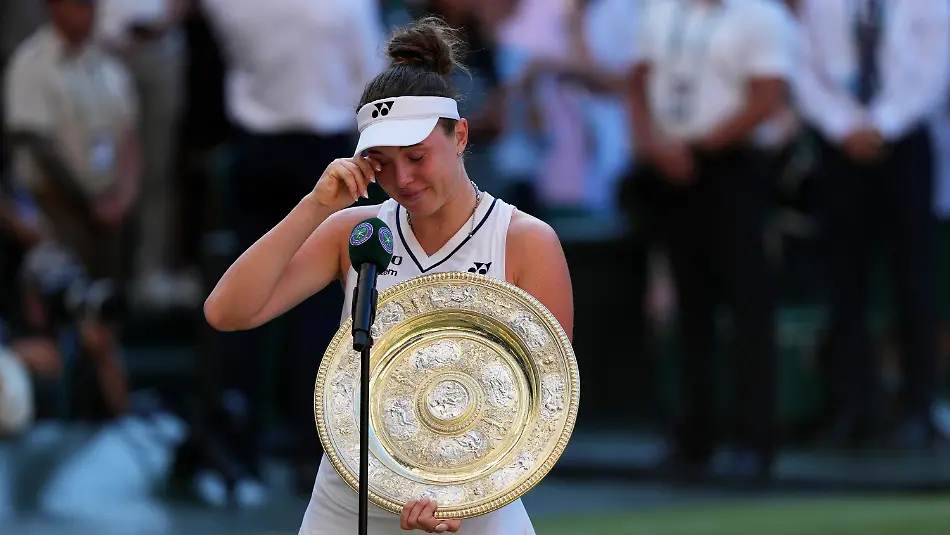 Linda-Noskova-of-Czech-Republic-reacts-as-she-holds-the-trophy-after-winning-against-Karolina-Muchova-of-Czech-Republic-in-the-women-s-singles-final-at-Wimbledon-Tennis-Championships-in-London-Saturday-July-11-2026