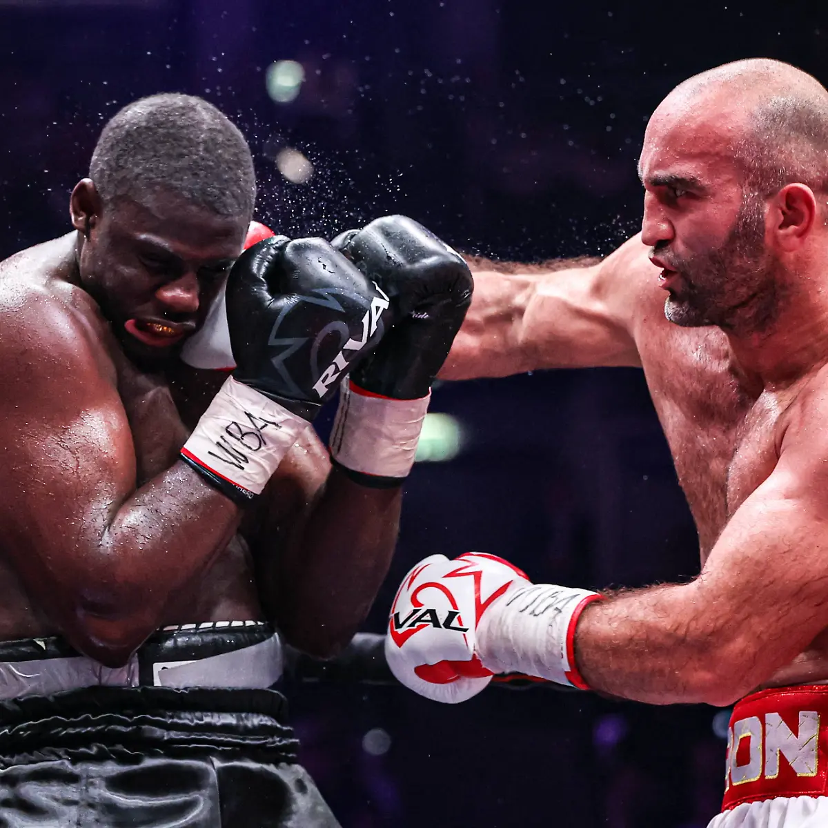 RUSSIA-MOSCOW-JULY-11-2026-Germany-s-Peter-Kadiru-L-and-Russia-s-Murat-Gassiev-fight-in-their-heavyweight-bout-as-part-of-IBA-PRO-19-a-boxing-event-at-the-VTB-Arena