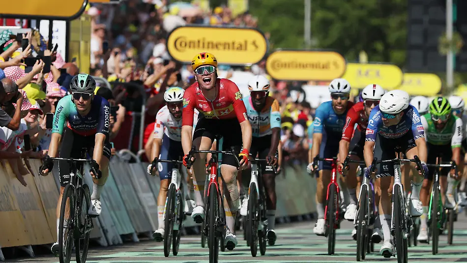 Cycling-Tour-de-France-Stage-11-Vichy-to-Nevers-Nevers-France-July-15-2026-Uno-X-Mobility-s-Soren-Waerenskjold-celebrates-winning-stage-11-REUTERS-Gonzalo-Fuentes