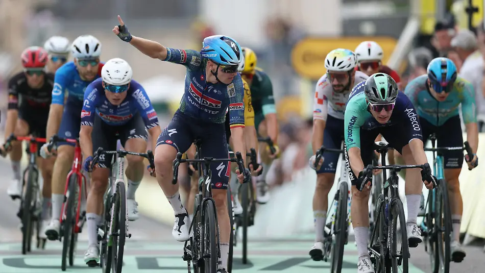 Cycling-Tour-de-France-Stage-12-Circuit-Nevers-Magny-Cours-to-Chalon-sur-Saone-Chalon-sur-Saone-France-July-16-2026-Soudal-Quick-Step-s-Tim-Merlier-celebrates-winning-stage-12-REUTERS-Gonzalo-Fuentes