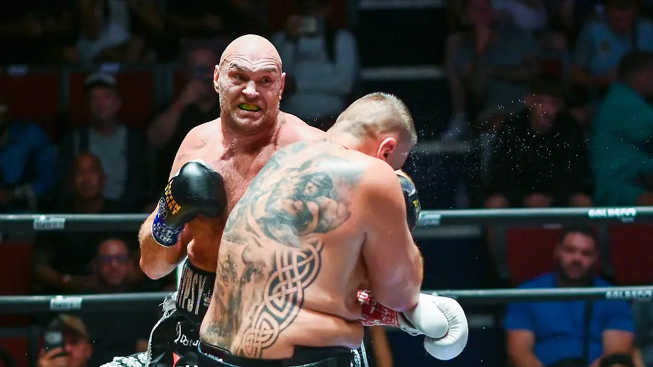 July-24-2026-Pattaya-Chonburi-Thailand-Tyson-Fury-L-and-Mariusz-Wach-R-trading-punches-during-their-heavyweight-boxing-bout-Tyson-Fury-defeats-Mariusz-Wach-by-corner-retirement-after-seven-rounds-to-win-the-WBC-Humanitarian-Belt-at-Max-Muay-Thai-Stadium