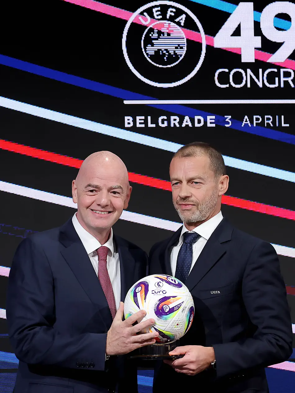 250403-BELGRADE-April-3-2025-Xinhua-FIFA-President-Gianni-Infantino-L-and-UEFA-president-Aleksander-Ceferin-pose-for-photos-during-the-49th-UEFA-ordinary-Congress-at-the-Sava-Center-in-Belgrade-Serbia-April-3-2025
